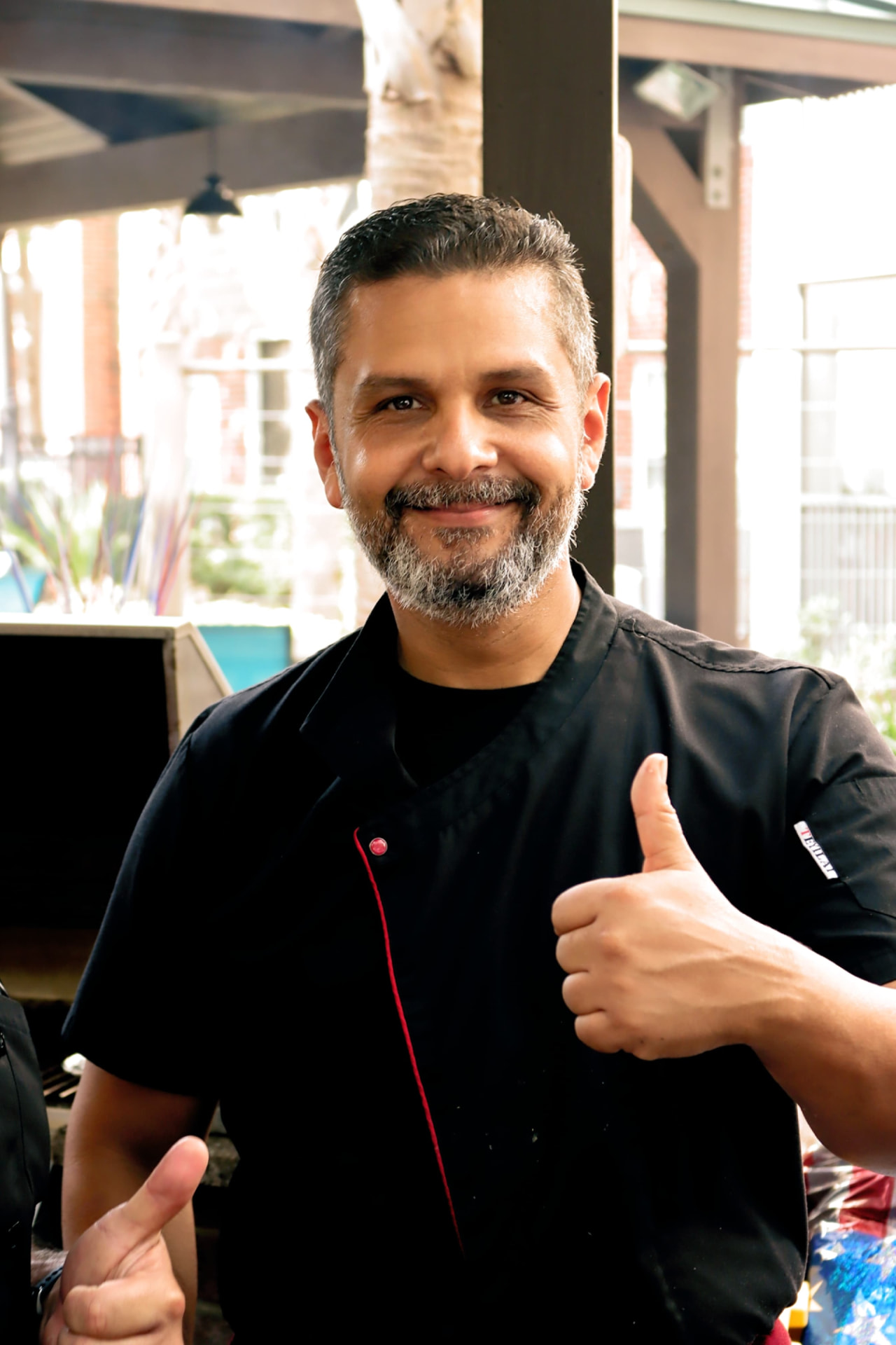 DL culinary employee smiling at work
